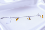Load image into Gallery viewer, Silver Baby Bracelet with Yellow Fish Charms