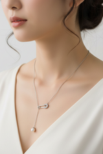 Load image into Gallery viewer, Silver Safety Pin Necklace with Pearl Drop.