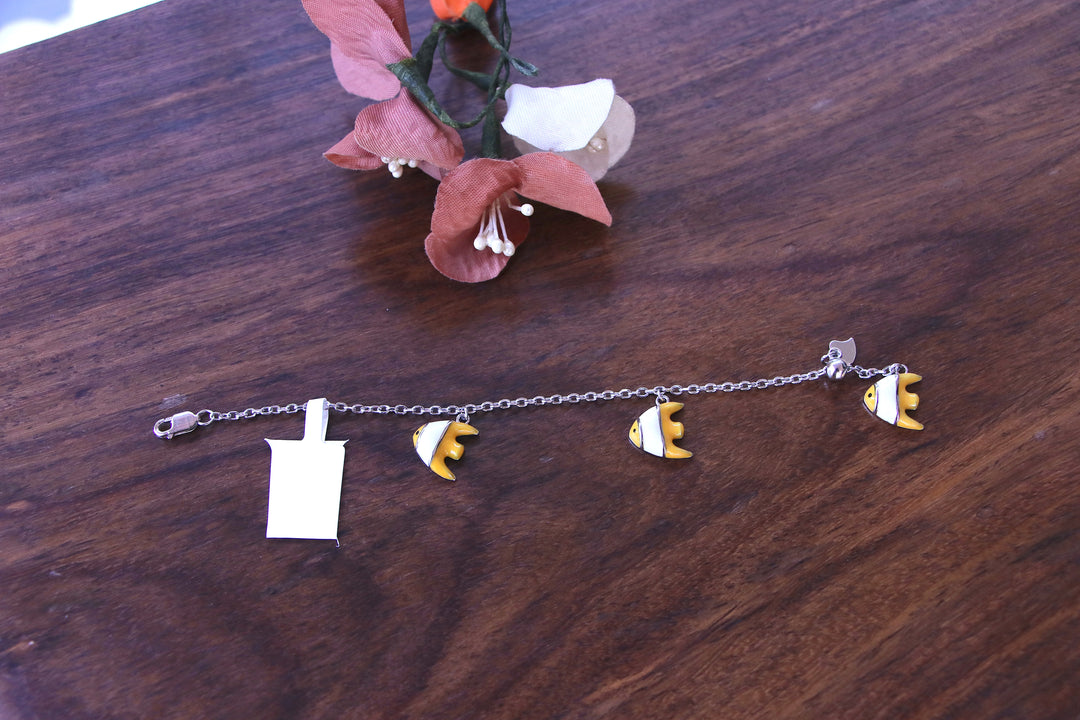 Silver Baby Bracelet with Yellow Fish Charms