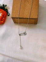 Load image into Gallery viewer, Silver Safety Pin Necklace with Pearl Drop.